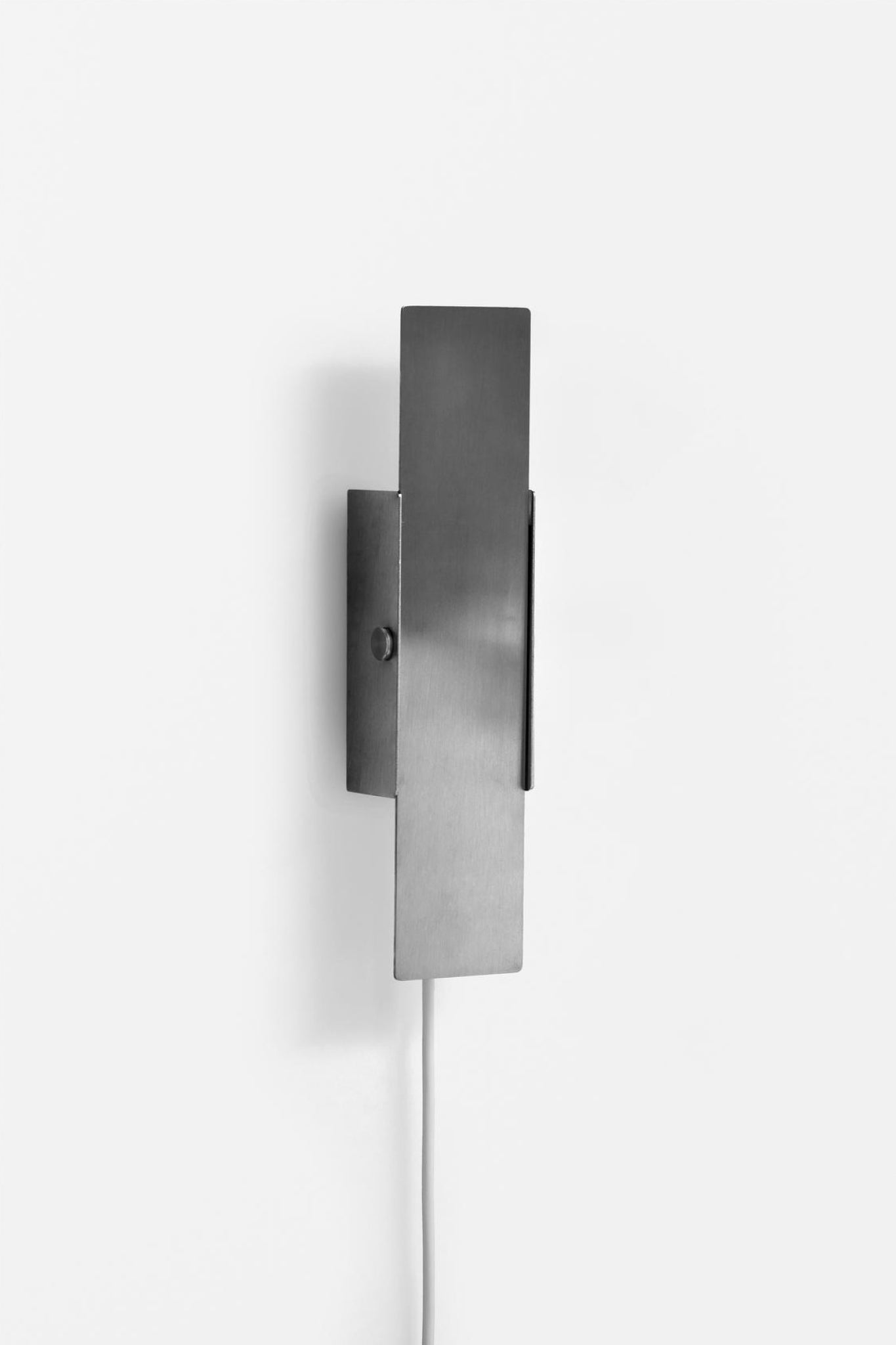 Illuminate Your Space with MOEBE's Stainless Steel Pivoting Wall Lamp