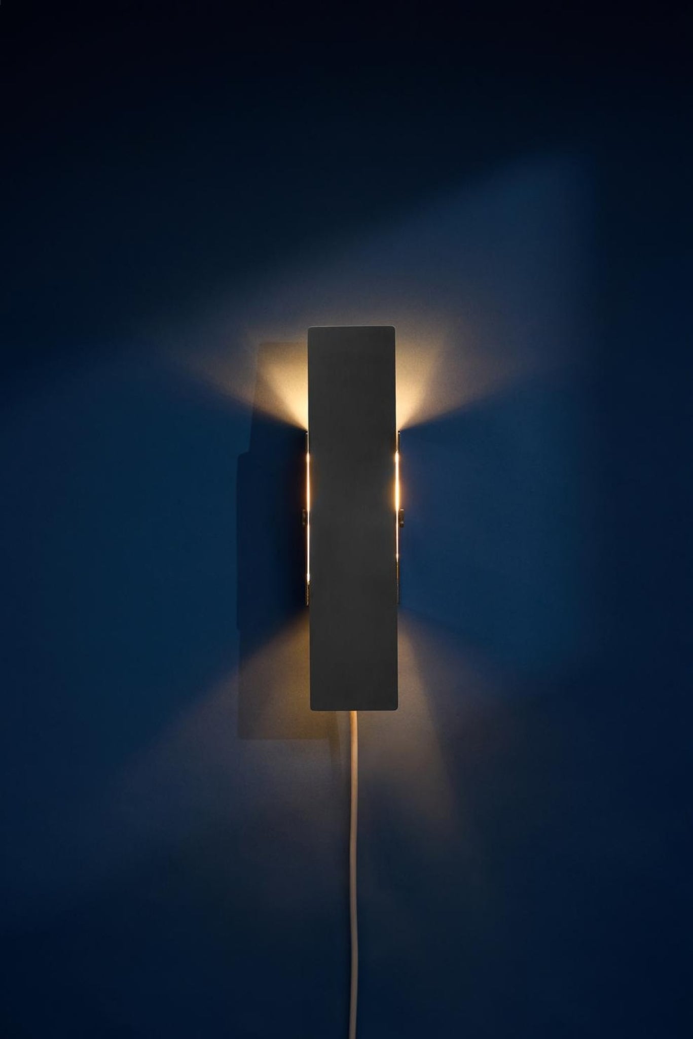 Illuminate Your Space with MOEBE's Stainless Steel Pivoting Wall Lamp