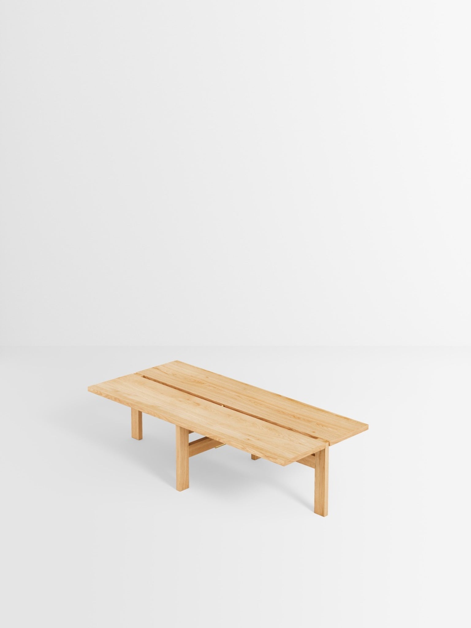 Moebe 115cm Oak Coffee Table: Sleek Design with Cross-Leg Frame