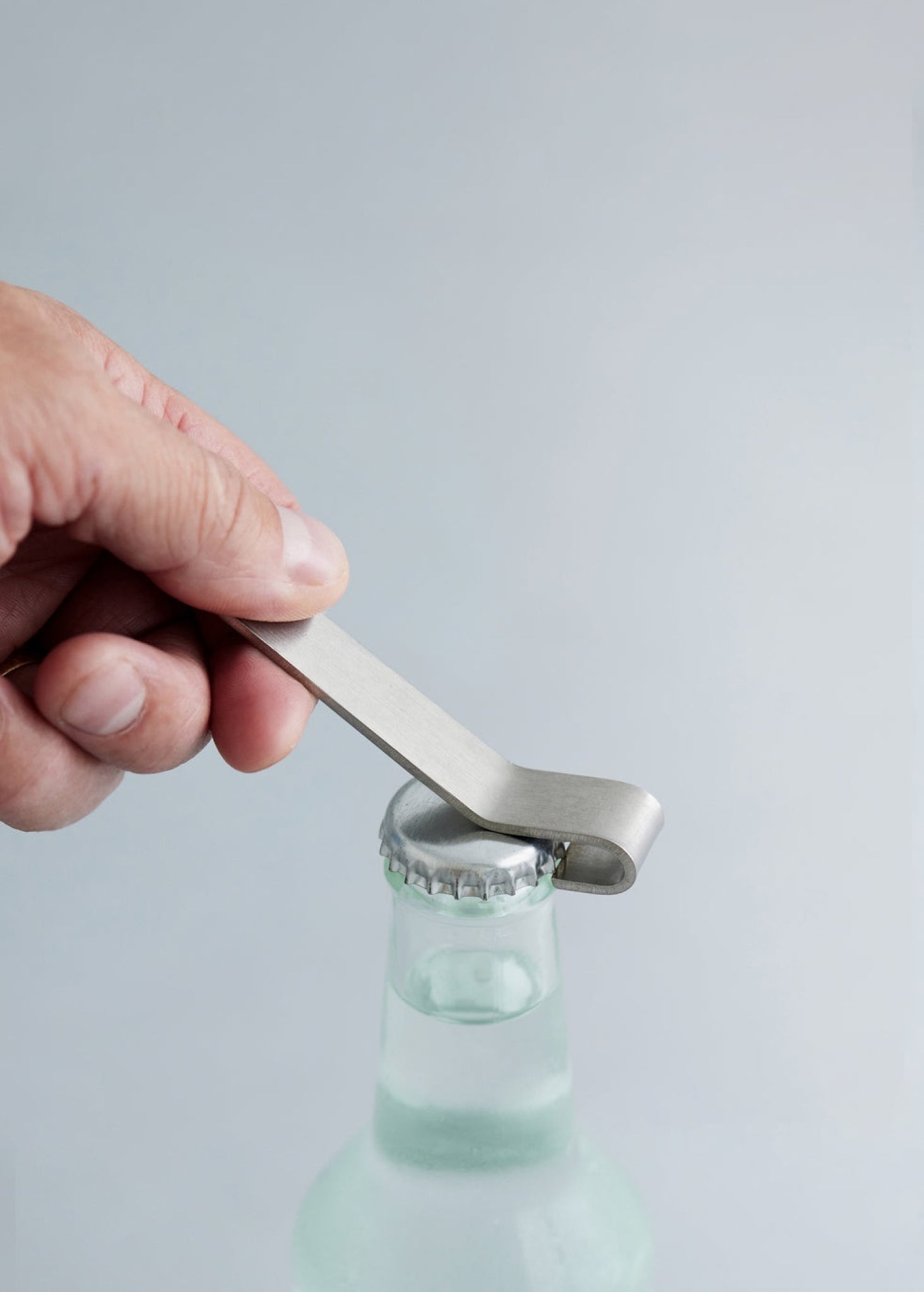 Elegant Moebe Bottle Opener: Stainless Steel & Brass Danish Design