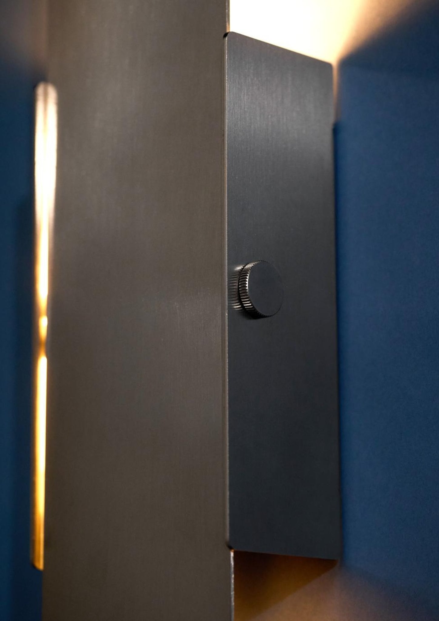 Illuminate Your Space with MOEBE's Stainless Steel Pivoting Wall Lamp