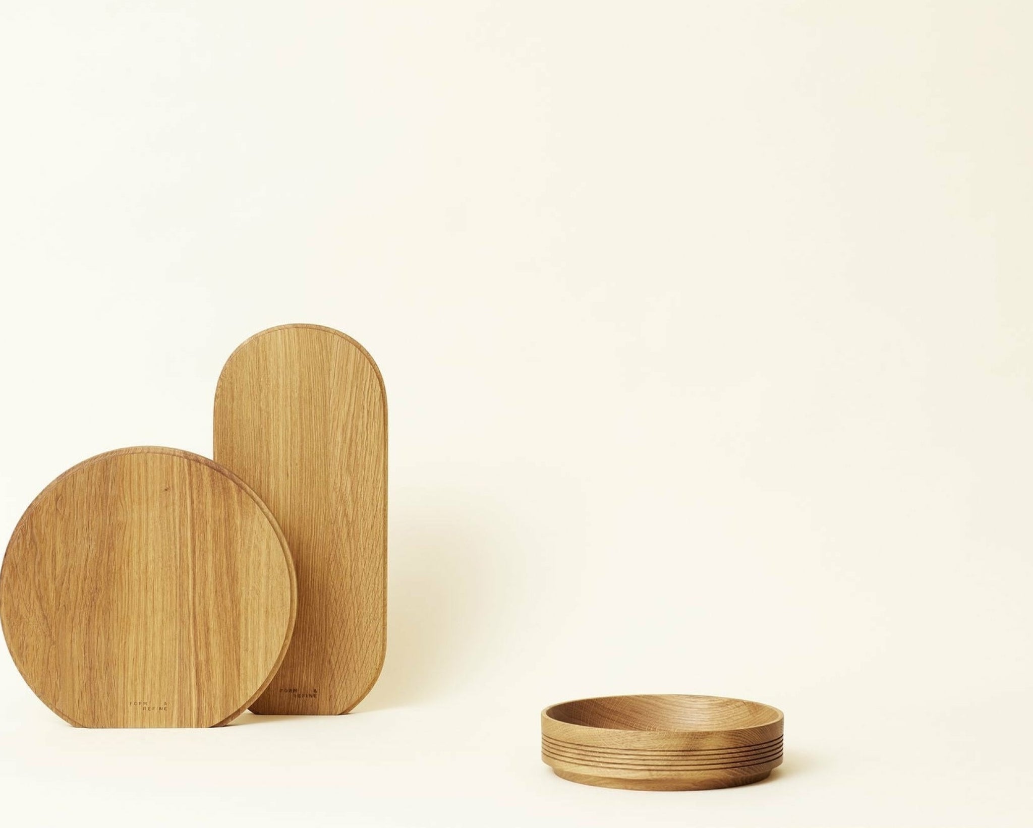 Form & Refine Section Cutting Board. Round