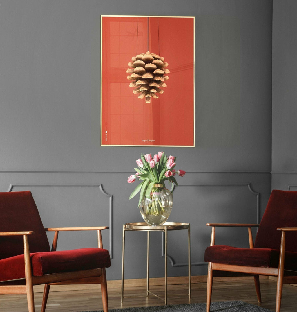 Brainchild pine cone classic poster, frame made of light wood 50x70 cm, red background