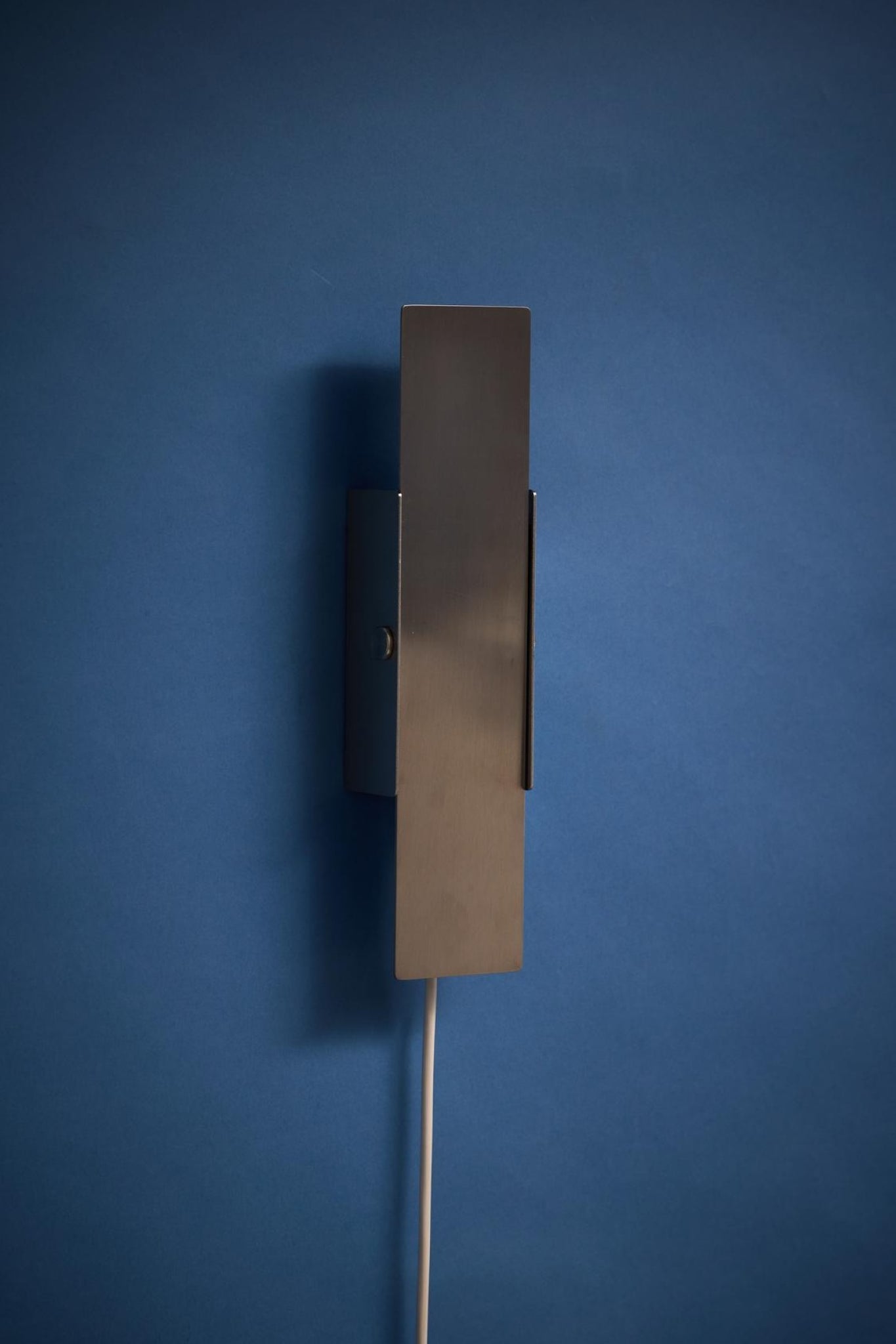 Illuminate Your Space with MOEBE's Stainless Steel Pivoting Wall Lamp