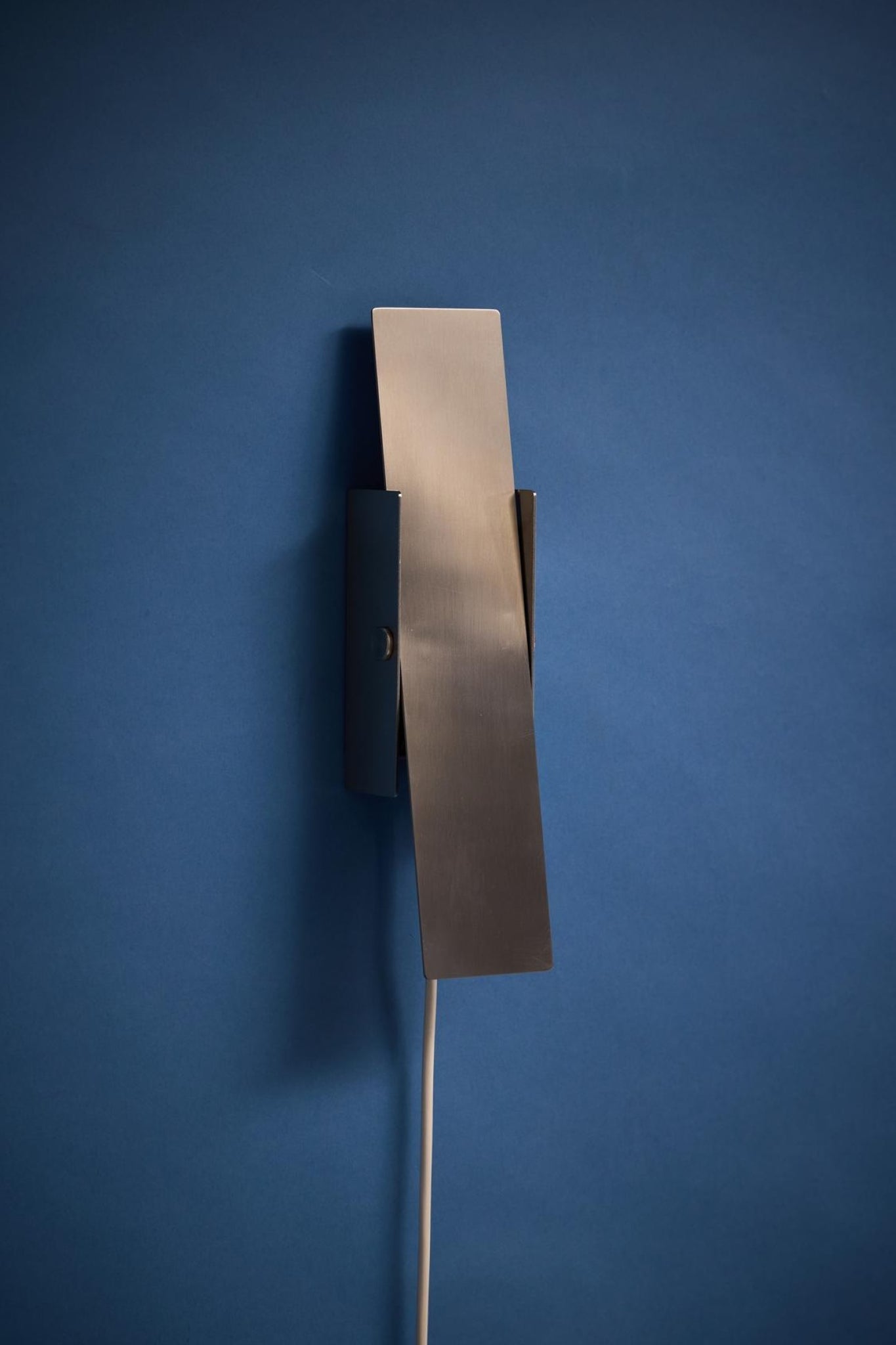 Illuminate Your Space with MOEBE's Stainless Steel Pivoting Wall Lamp
