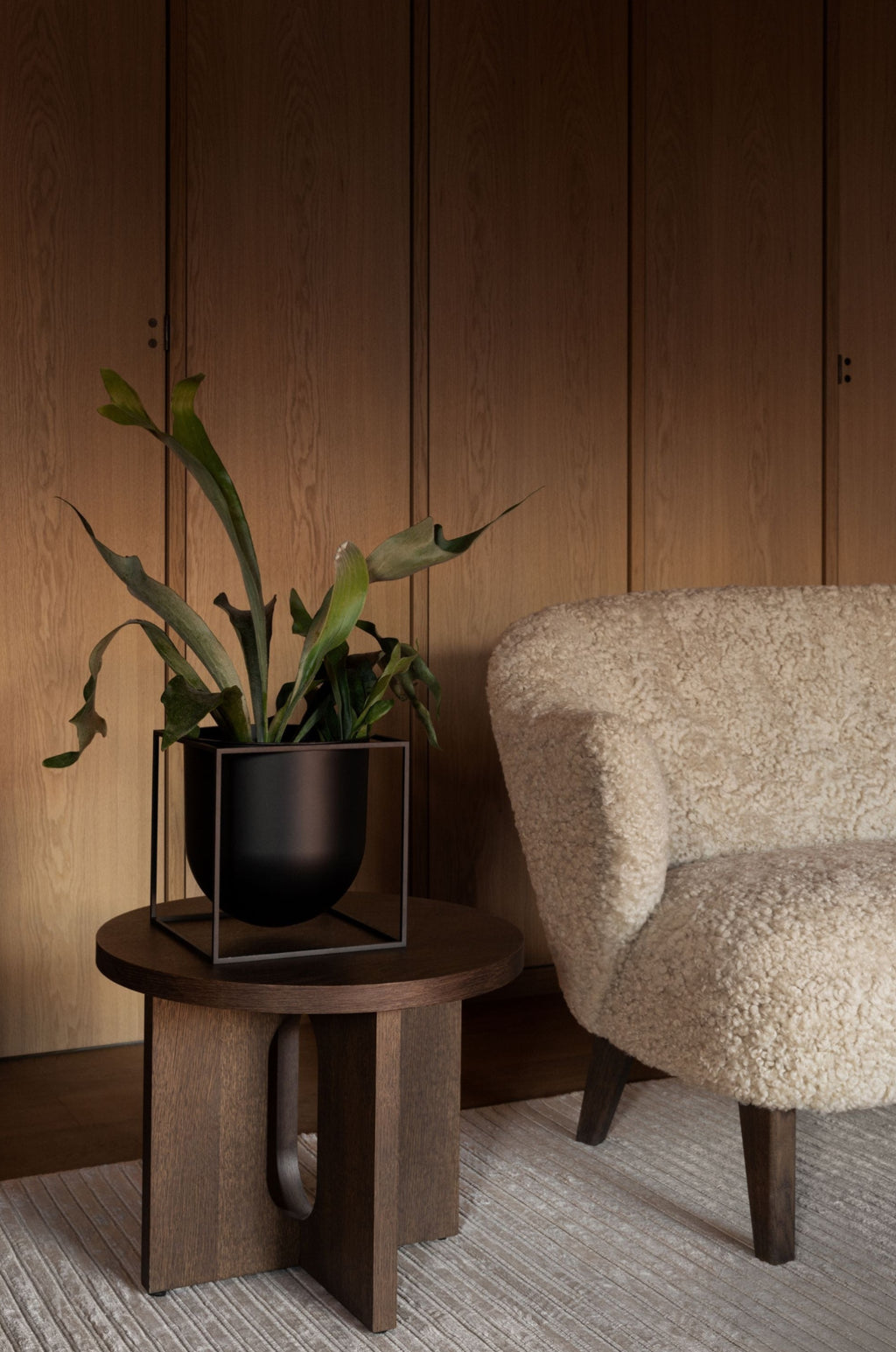 Audo Copenhagen Ingeborg Armchair with footstool, Moonlight lambskin/smoked oak